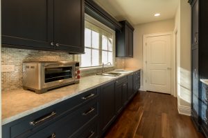 Butlers Pantry with navy cabinets
