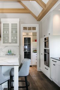 Farmhouse Plato Kitchen Cabinetry Display Refrigeration Ovens Hardware Island Seating White with natural wood stain