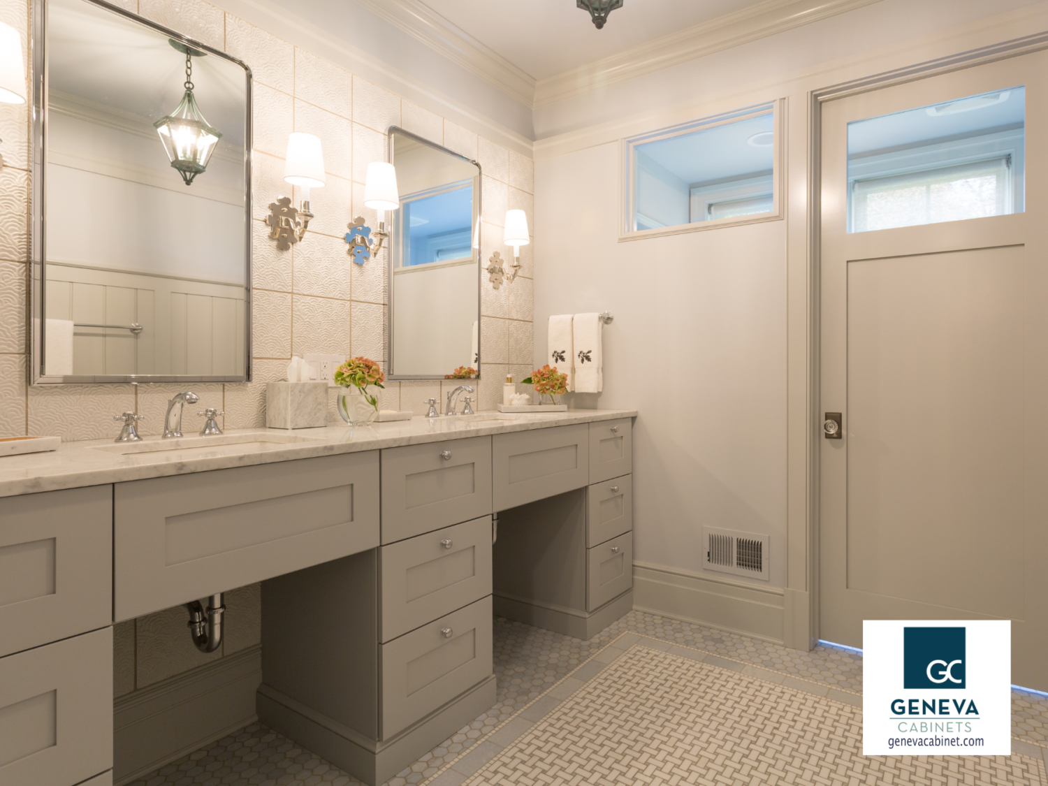 Neutral bathroom cabinet with interesting textured tile surround